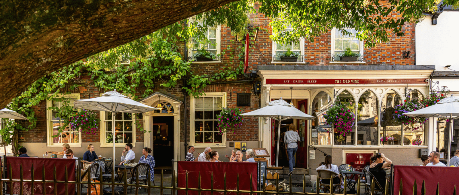 The exterior and outside seating area of The Old Vine, Winchester